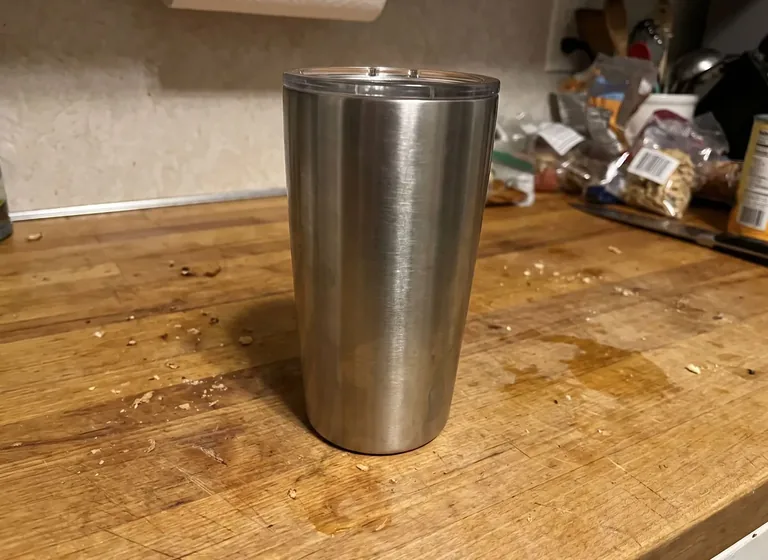 Lifestyle: a tumbler on a hiking trail: the original photo