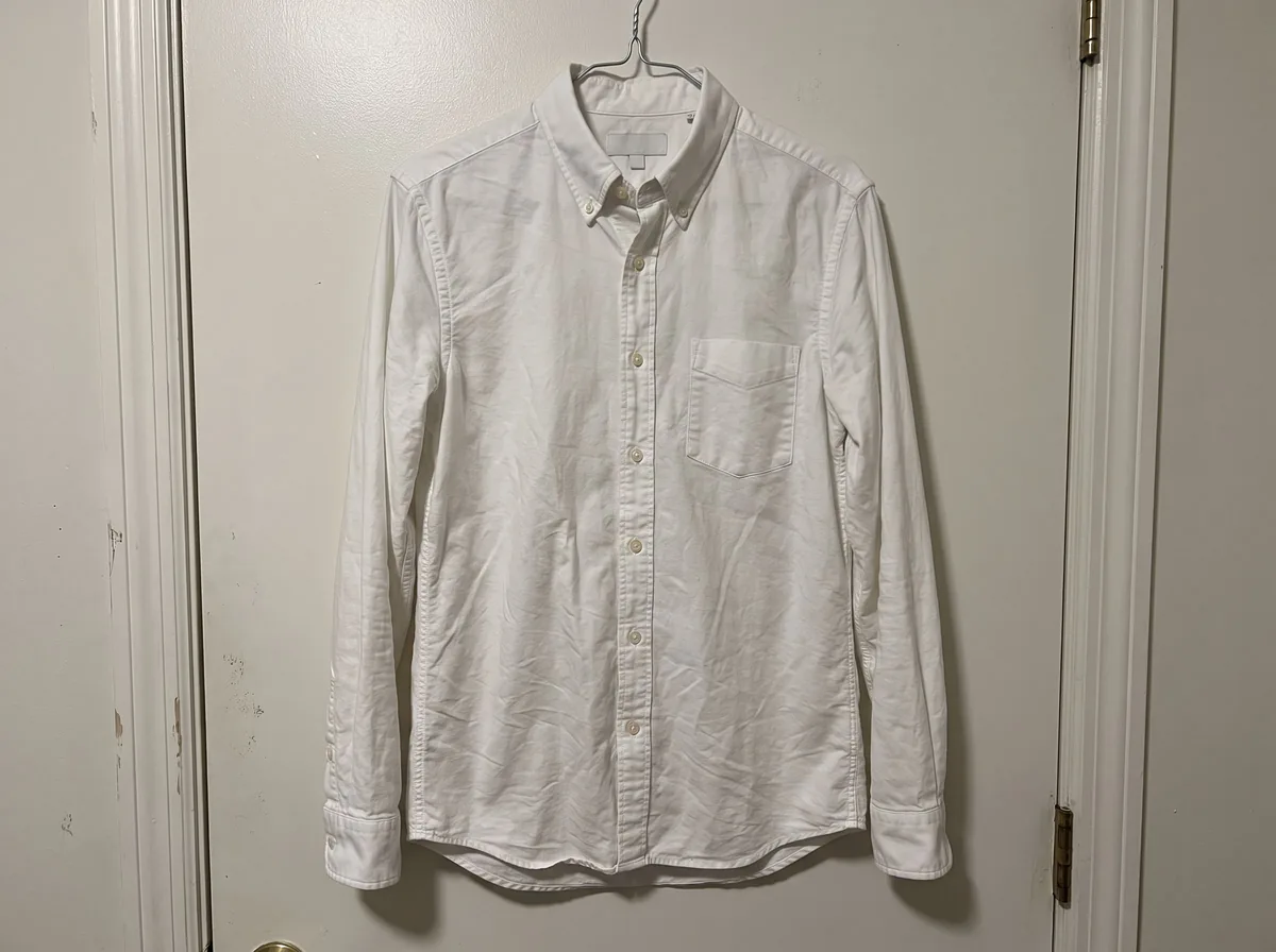 Phone photo before Clothing Flat Lay Generator: Styled Flat Lay Photos of Your Garments
