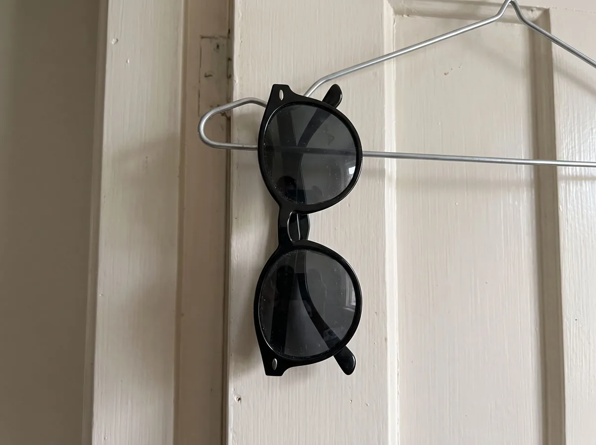Phone photo before Sunglasses on Model: Eyewear Photos on a Real-Looking Face